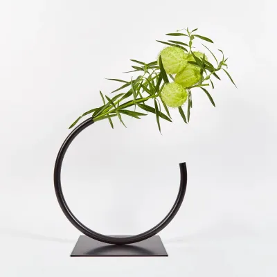 Edging Over Vase by Anna Varendorff